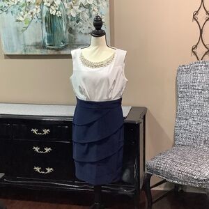 Connected Apparel White Top feature pearl accent with Navy Blue Pencil Skirt